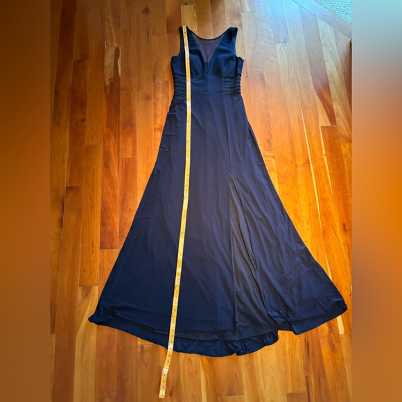 Navy blue fully lined ballgown with cutouts covered with navy, sheer mesh. - Picture 5 of 11